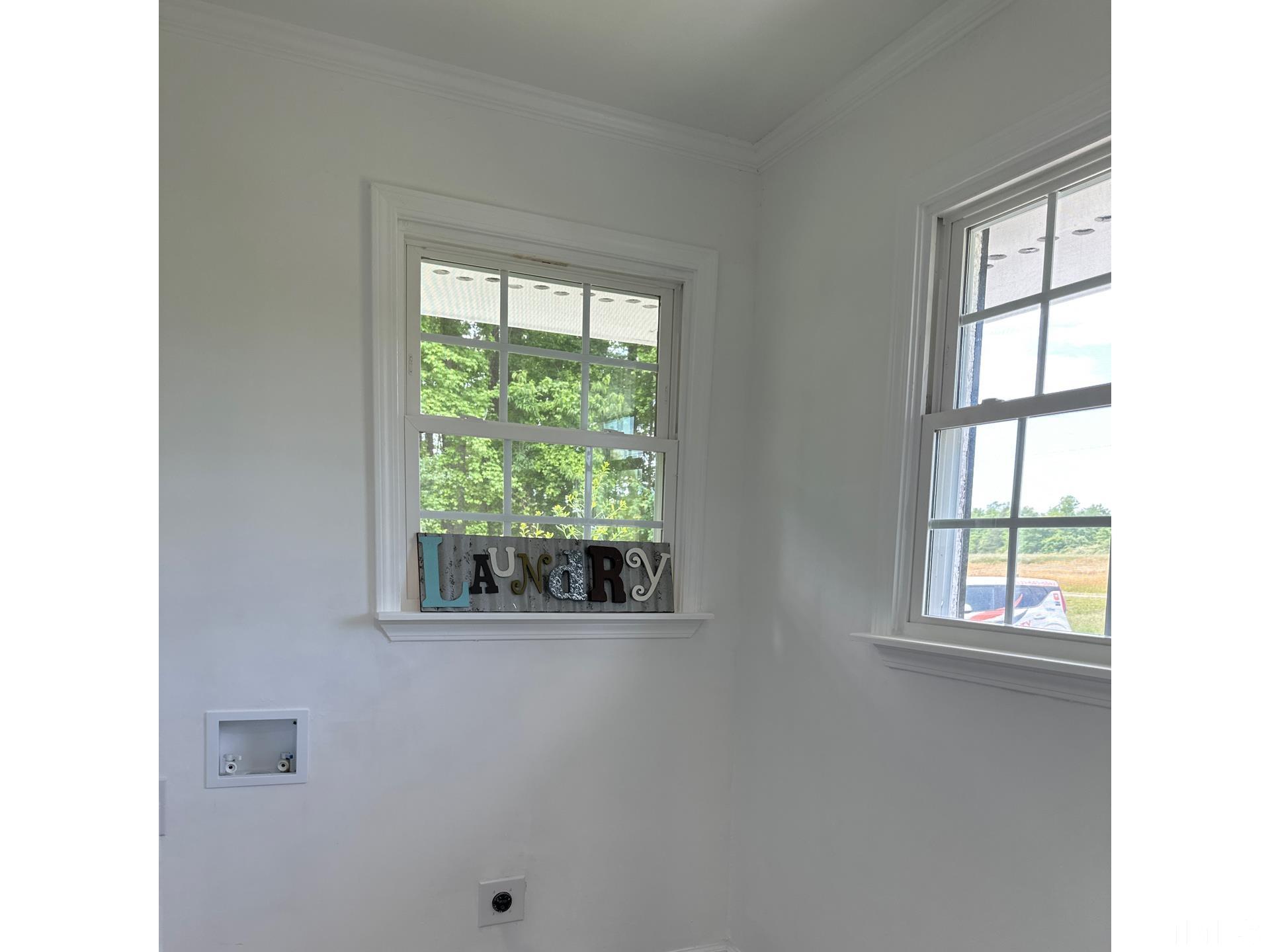 216 Trinity Church Road Louisburg, NC 27549 - Photo 10 of 28 a view of an empty room with a window