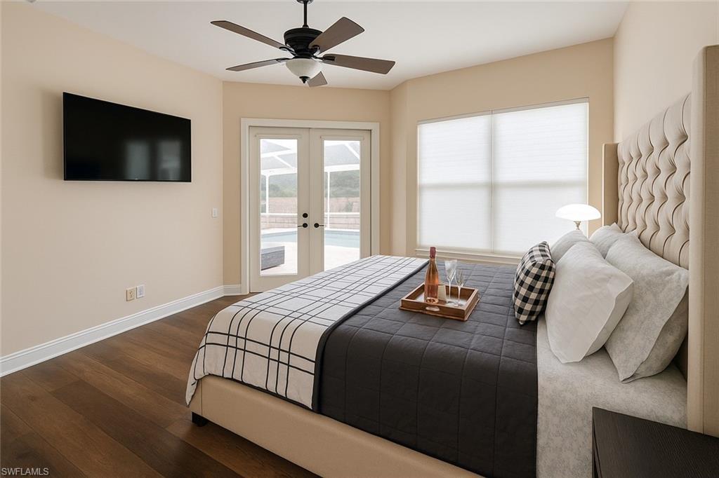 1975 San Marco Road Marco Island, FL 34145 - Photo 19 of 46 Bedroom with dark wood-style floors, a ceiling fan, access to outside, and french doors