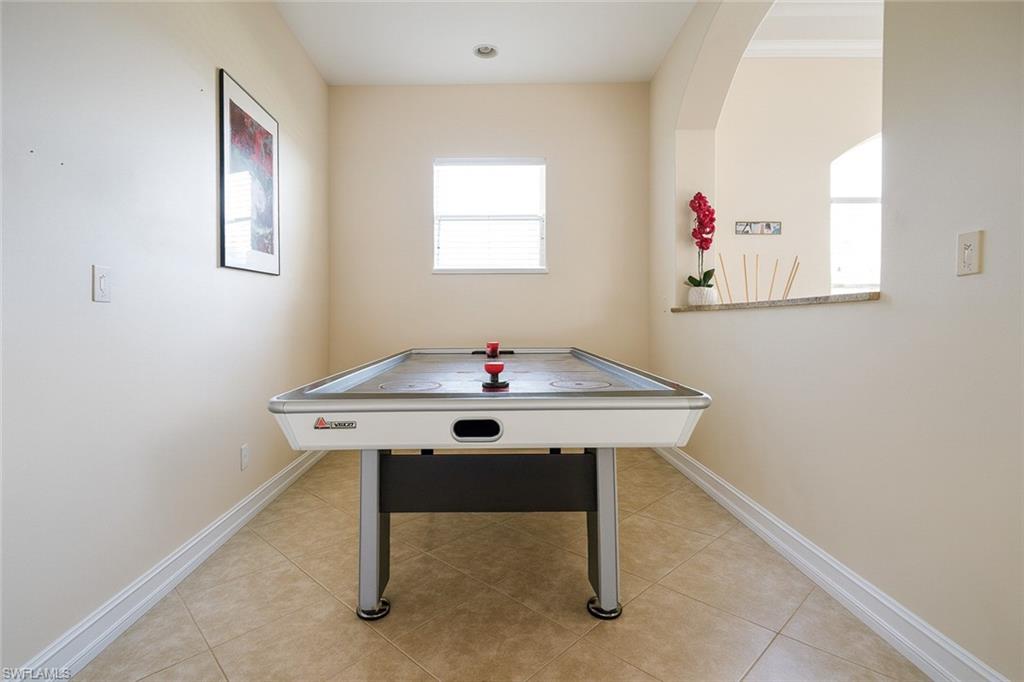 1975 San Marco Road Marco Island, FL 34145 - Photo 33 of 46 Recreation room featuring light tile patterned floors