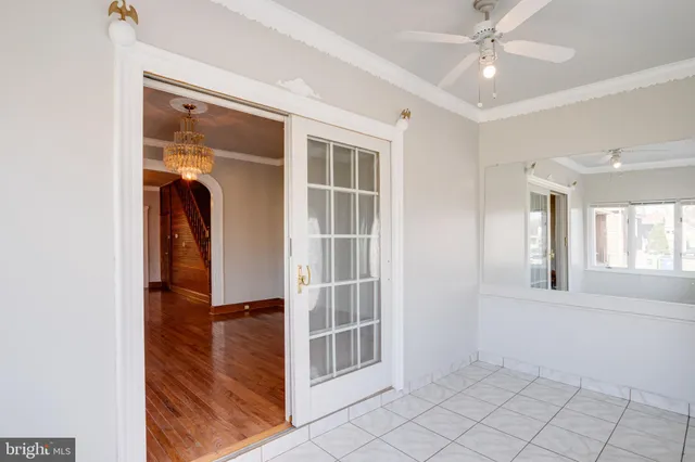 a view of an entryway with wooden floor