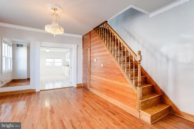 a view of entryway with wooden floor