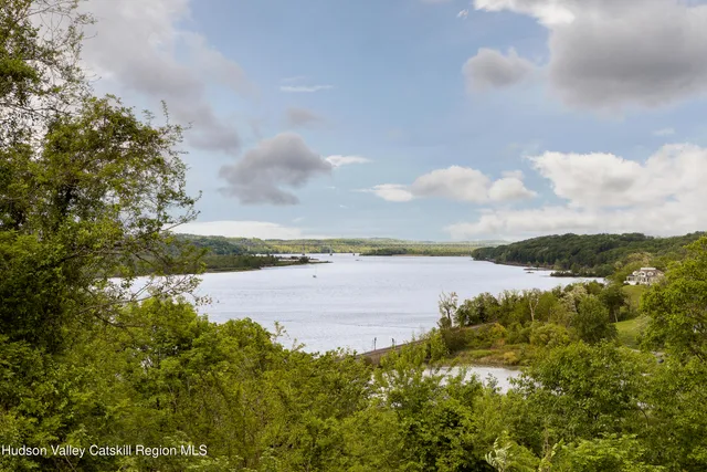 a view of a lake from a yard
