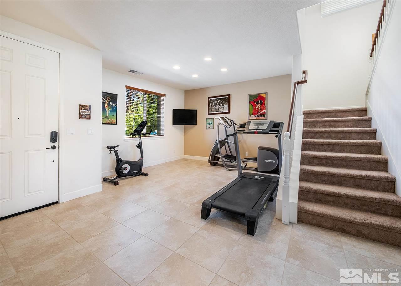 2048 Whitecliff Drive Reno, NV 89521 - Photo 13 of 23 a view of a livingroom with workspace and a couch