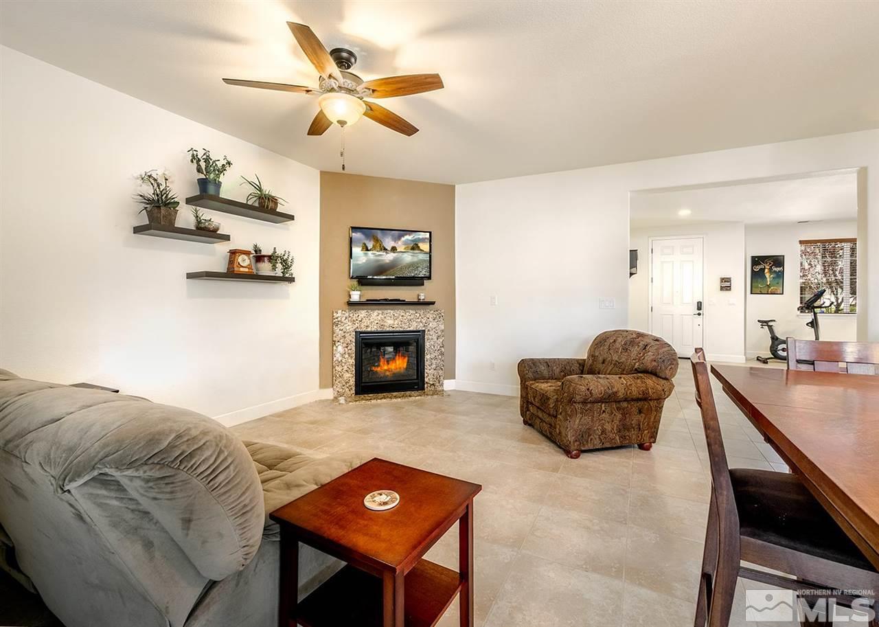 2048 Whitecliff Drive Reno, NV 89521 - Photo 6 of 23 a living room with furniture and a fireplace