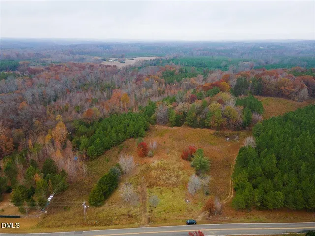 an aerial view of residential house with outdoor space