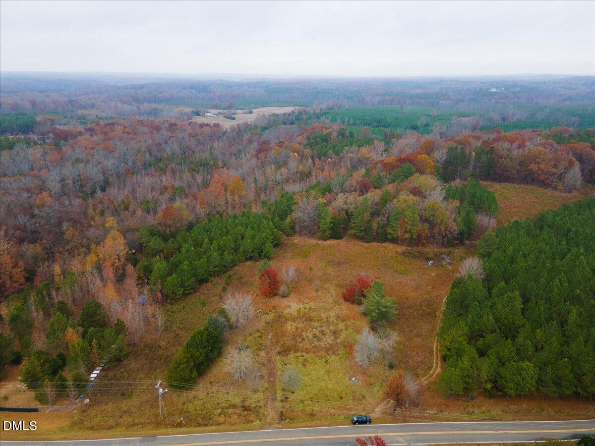 an aerial view of residential house with outdoor space