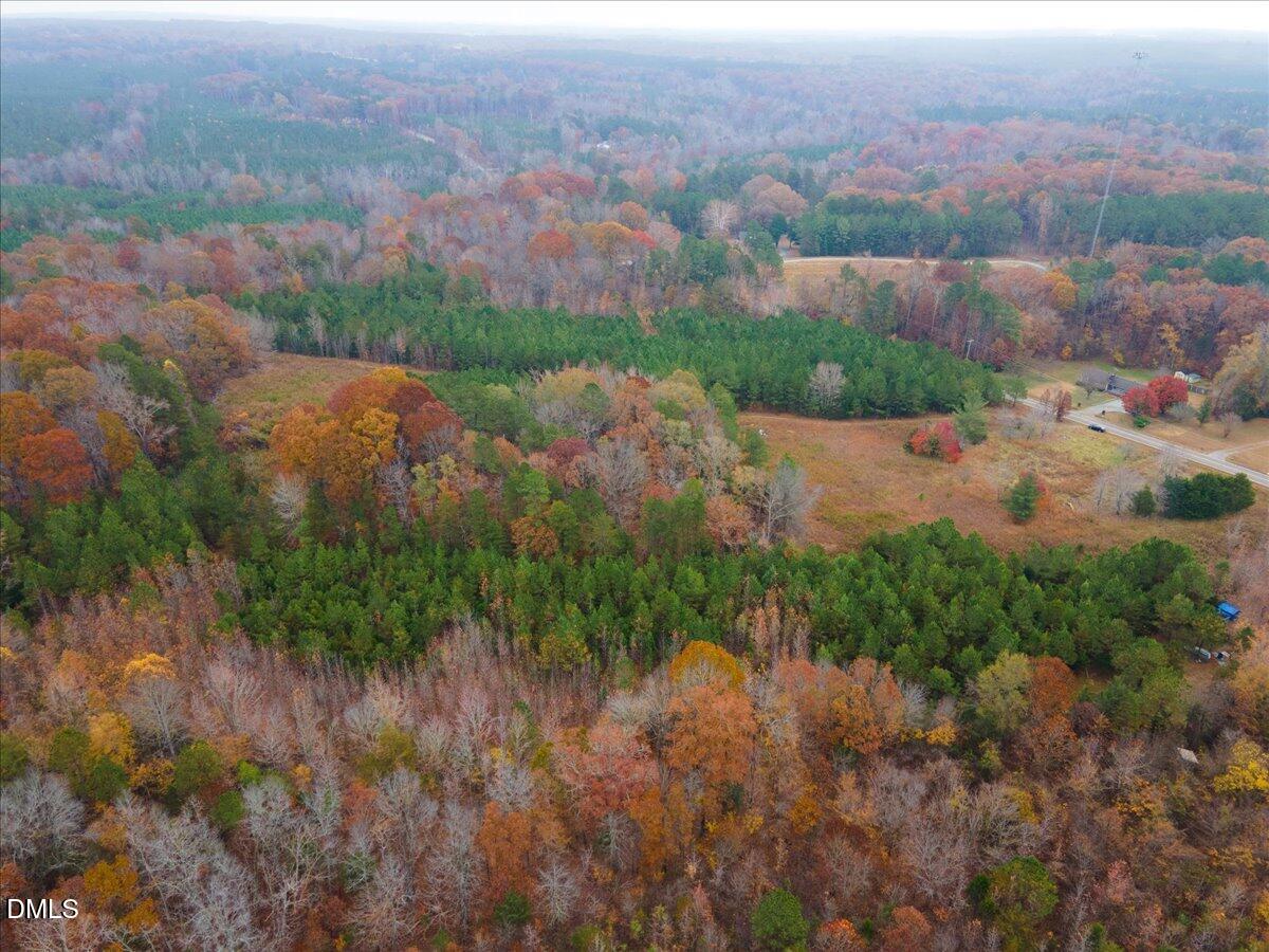 1923 Lawson Chapel Church Road Roxboro, NC 27574 - Photo 5 of 19 an aerial view of residential houses with outdoor space and trees