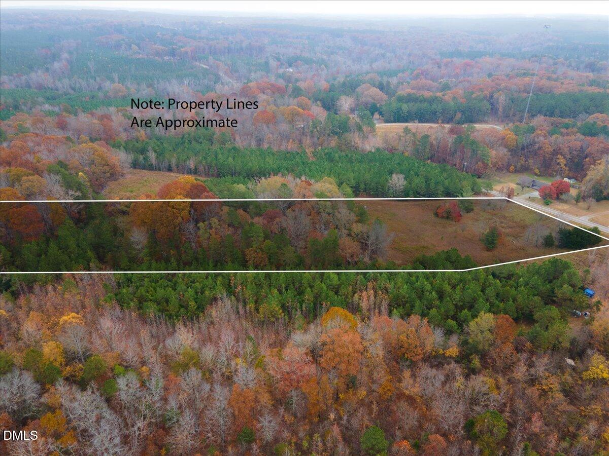 1923 Lawson Chapel Church Road Roxboro, NC 27574 - Photo 6 of 19 an aerial view of residential houses with outdoor space and trees