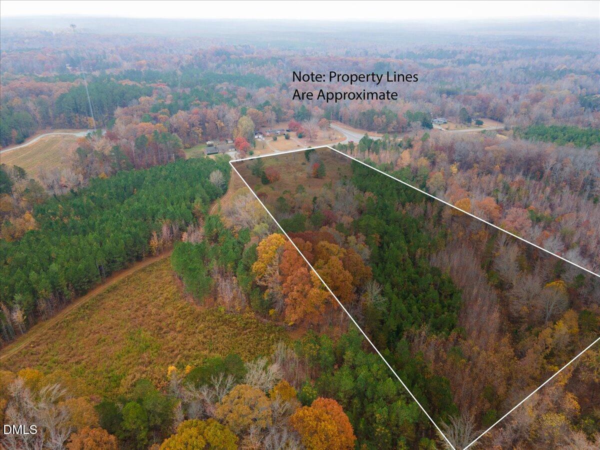 1923 Lawson Chapel Church Road Roxboro, NC 27574 - Photo 9 of 19 an aerial view of a house