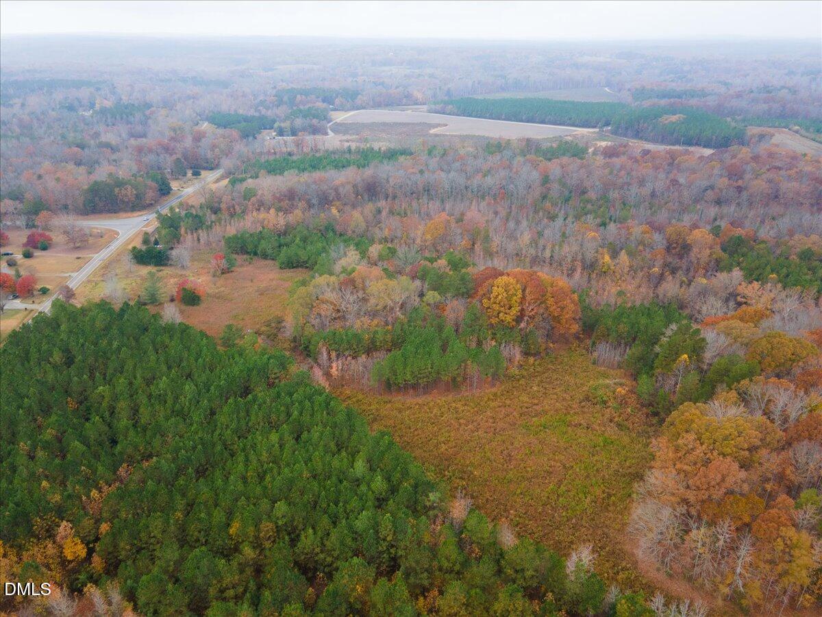 1923 Lawson Chapel Church Road Roxboro, NC 27574 - Photo 10 of 19 a view of a lake with beach and green space