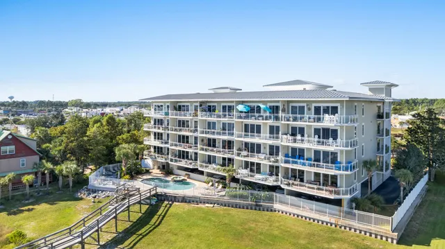 a view of a swimming pool with a lounge chairs