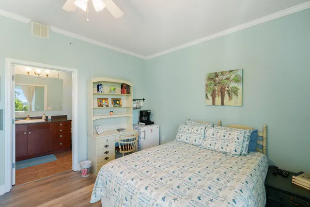 a bedroom with a bed and a cabinets