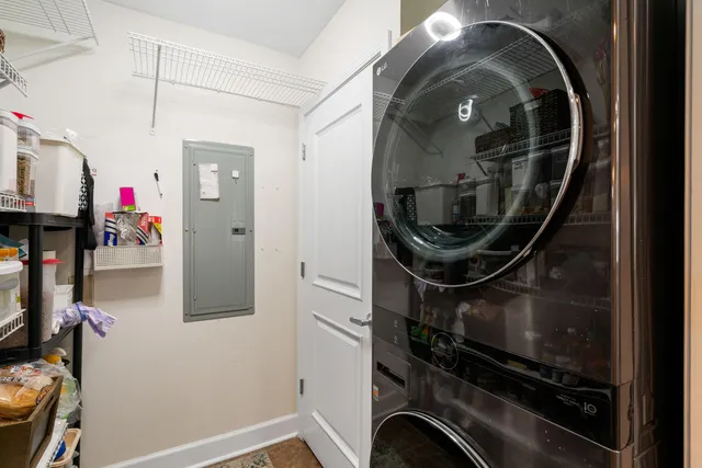 a room with water heater and a mirror
