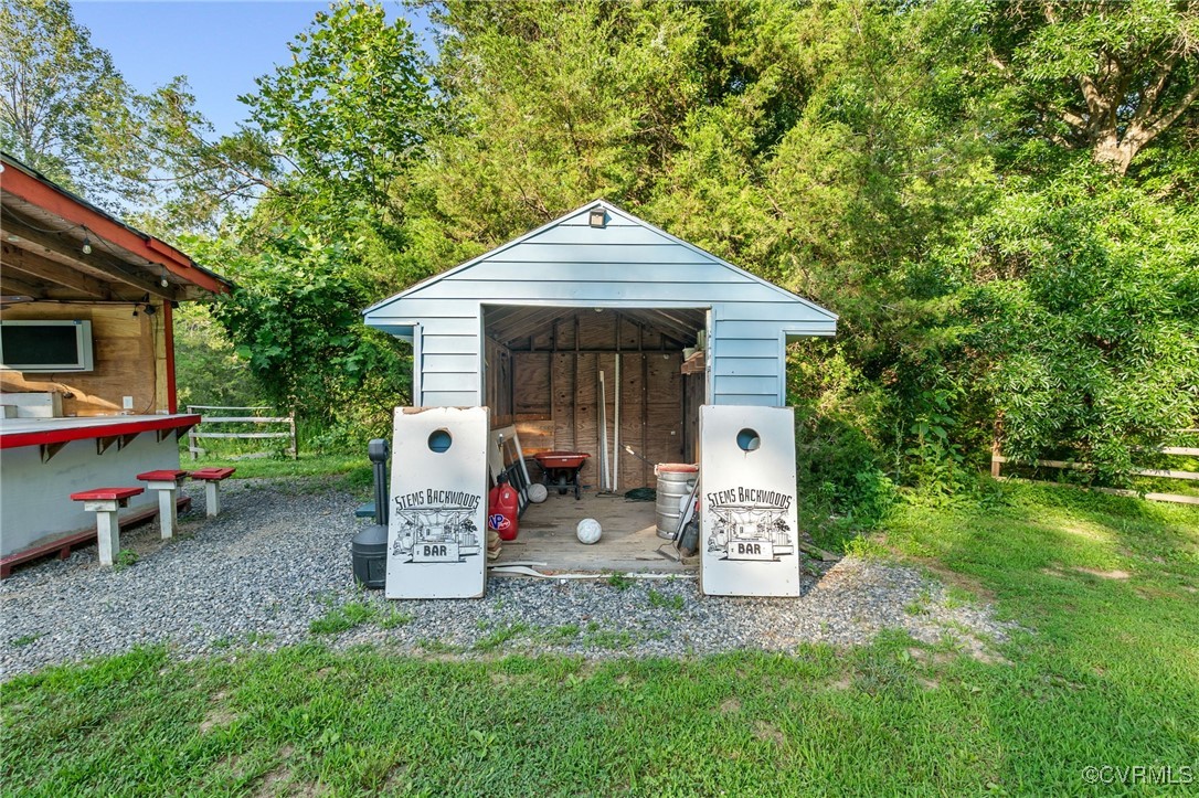 11925 Belfonte Road Bumpass, VA 23024 - Photo 28 of 34 a front view of a house with garden