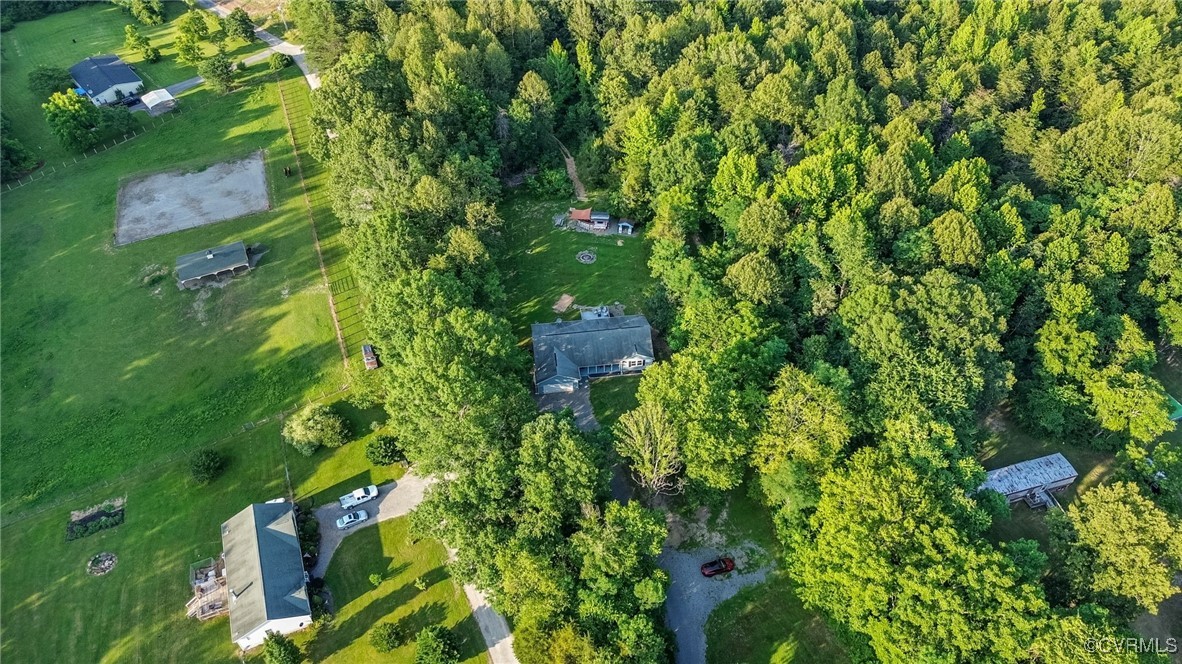 11925 Belfonte Road Bumpass, VA 23024 - Photo 3 of 34 a backyard of a house with lots of green space