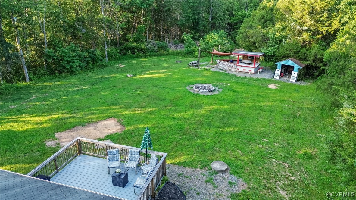 11925 Belfonte Road Bumpass, VA 23024 - Photo 33 of 34 a view of a chair and table on the garden