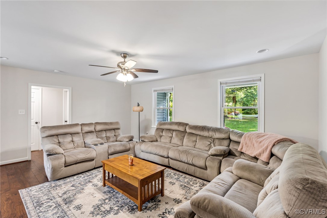 11925 Belfonte Road Bumpass, VA 23024 - Photo 7 of 34 a living room with furniture and a large window