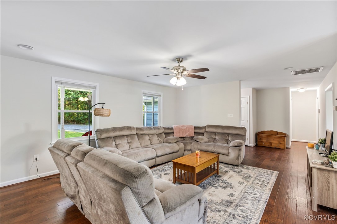 11925 Belfonte Road Bumpass, VA 23024 - Photo 8 of 34 a living room with furniture and a large window