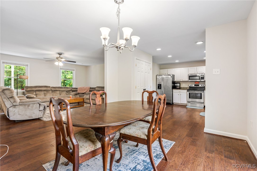 11925 Belfonte Road Bumpass, VA 23024 - Photo 10 of 34 a view of a dining room with furniture and wooden floor