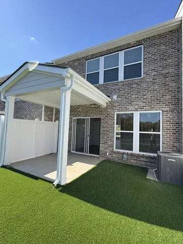 a view of a house with a garden