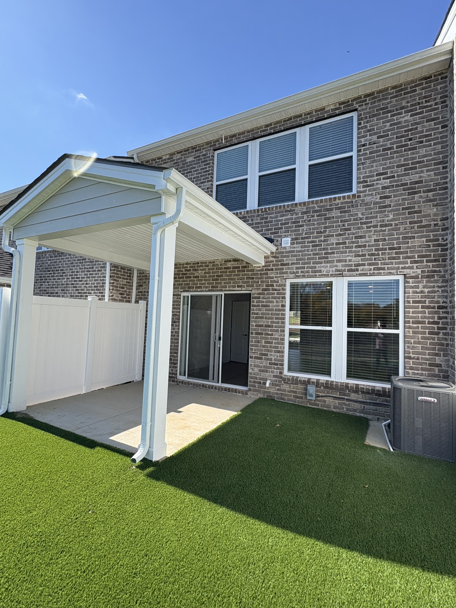 7119 Mapleside Lane, Unit 47 Fairview, TN 37062 - Photo 2 of 5 a view of a house with a garden