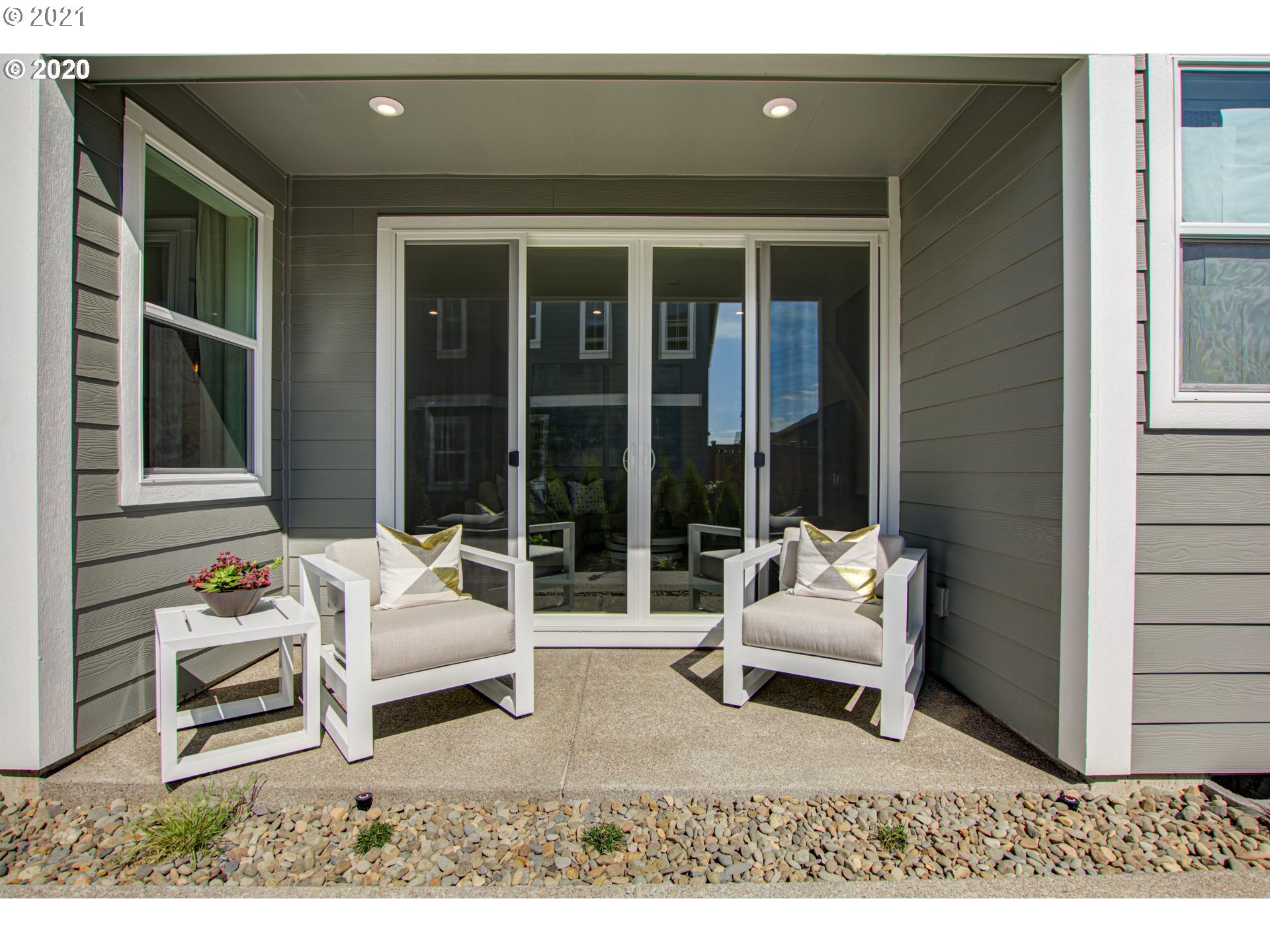 8229 Southeast Kinnaman Road Hillsboro, OR 97123 - Photo 11 of 21 a building outdoor space with patio furniture