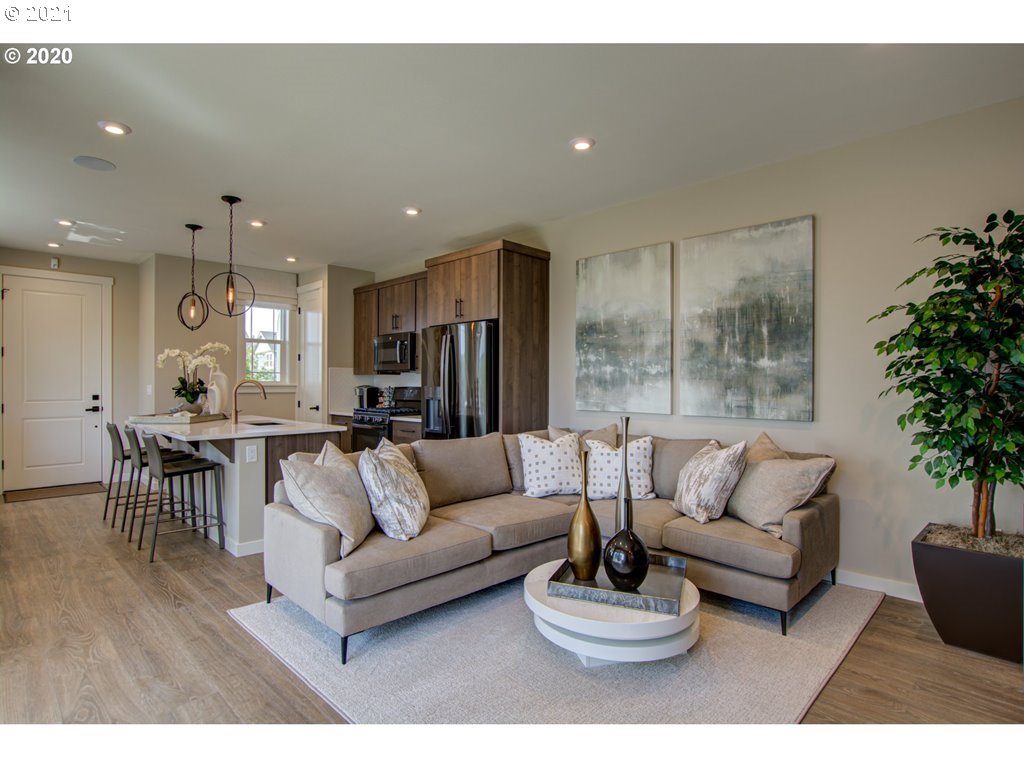 8229 Southeast Kinnaman Road Hillsboro, OR 97123 - Photo 4 of 21 a living room with furniture and a large window