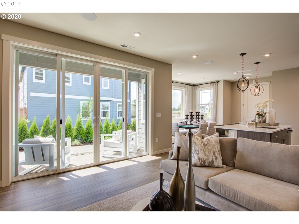 8229 Southeast Kinnaman Road Hillsboro, OR 97123 - Photo 5 of 21 a living room with furniture and a large window