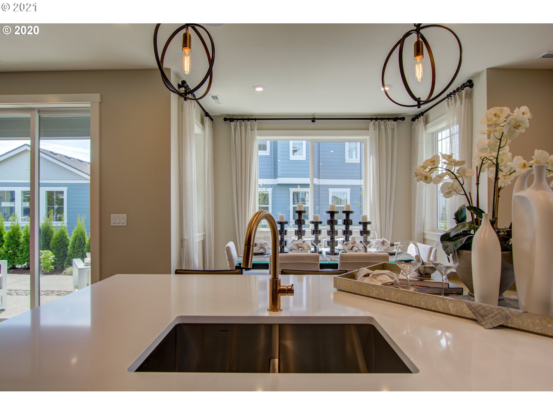 8229 Southeast Kinnaman Road Hillsboro, OR 97123 - Photo 6 of 21 a kitchen with a sink and a white cabinets
