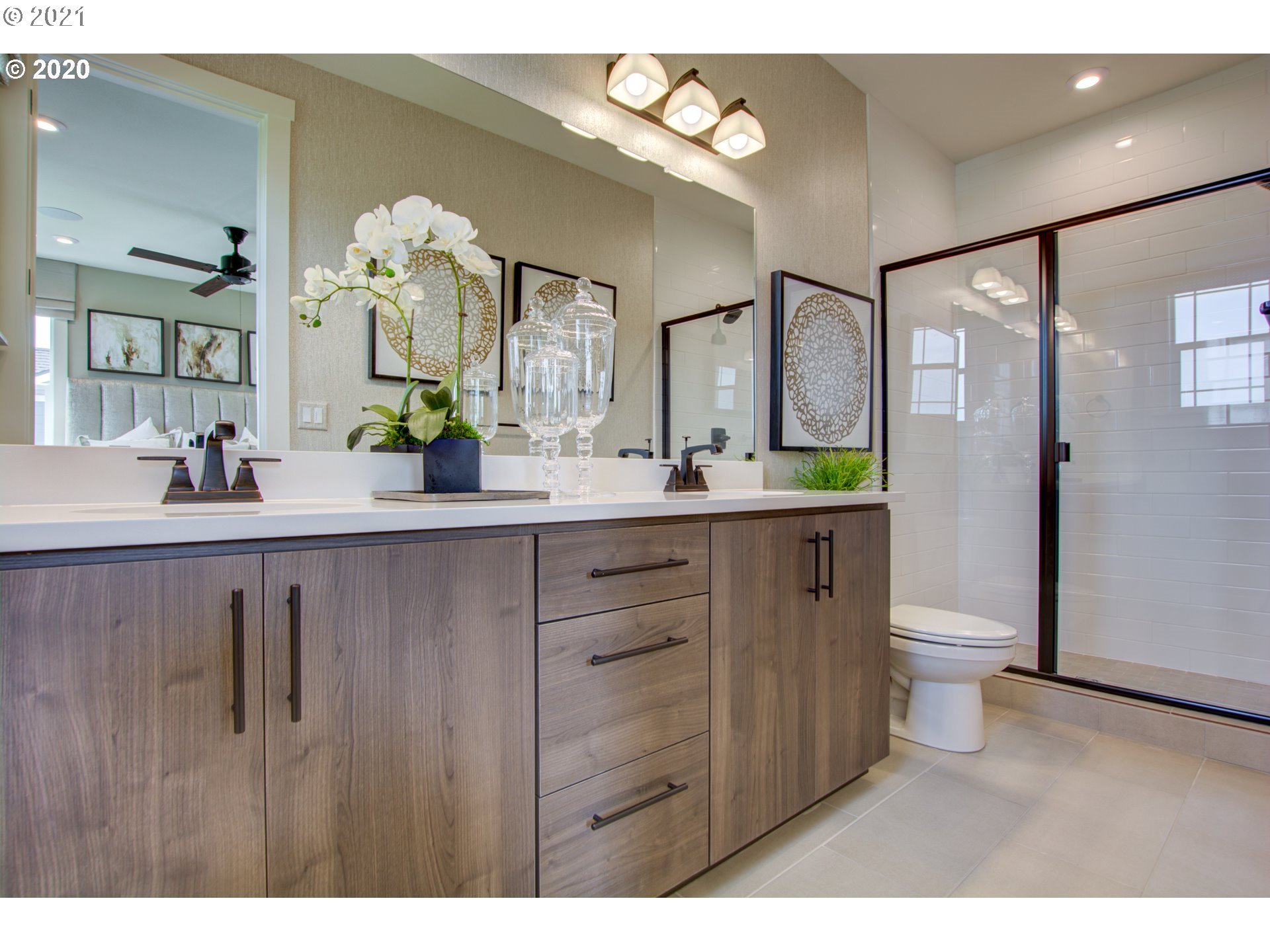 8229 Southeast Kinnaman Road Hillsboro, OR 97123 - Photo 8 of 21 a bathroom with a double vanity sink and a mirror