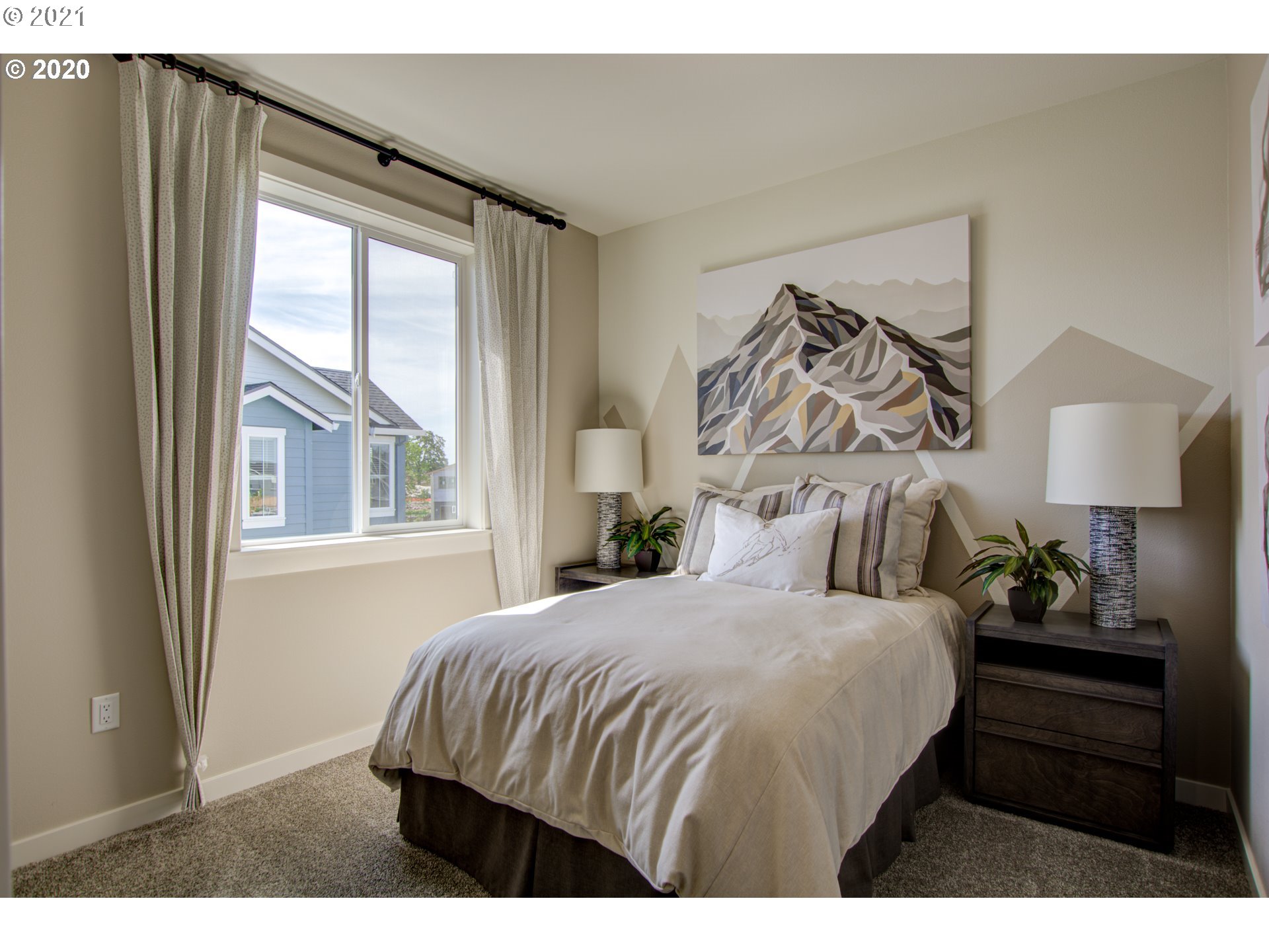 8229 Southeast Kinnaman Road Hillsboro, OR 97123 - Photo 10 of 21 a bedroom with a bed and a window