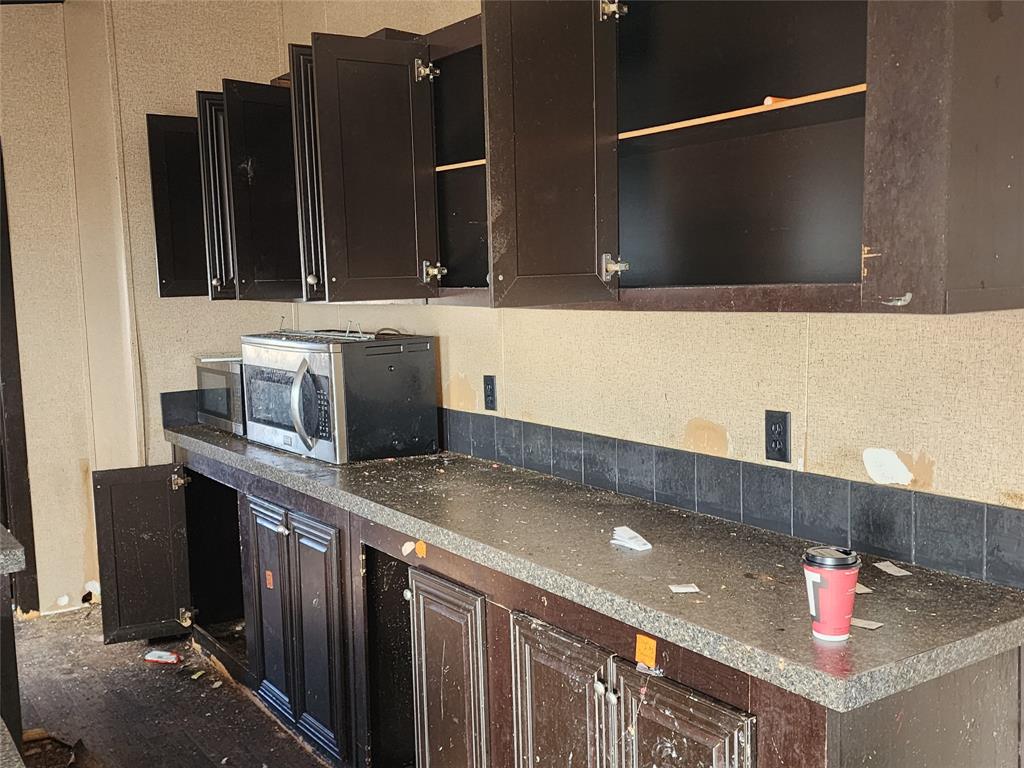10279 Private Road 6055 Hawley, TX 79525 - Photo 6 of 9 a bathroom with a sink and a mirror