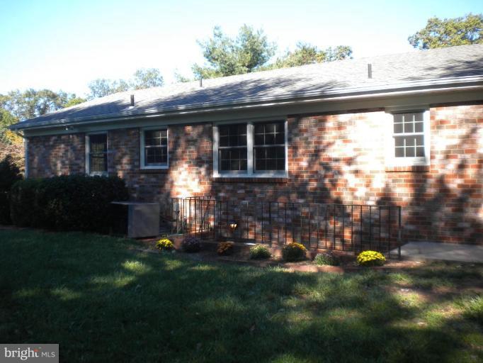 10004 Clearspring Road Damascus, MD 20872 - Photo 3 of 30 All brick...rear entrance to the lower level.