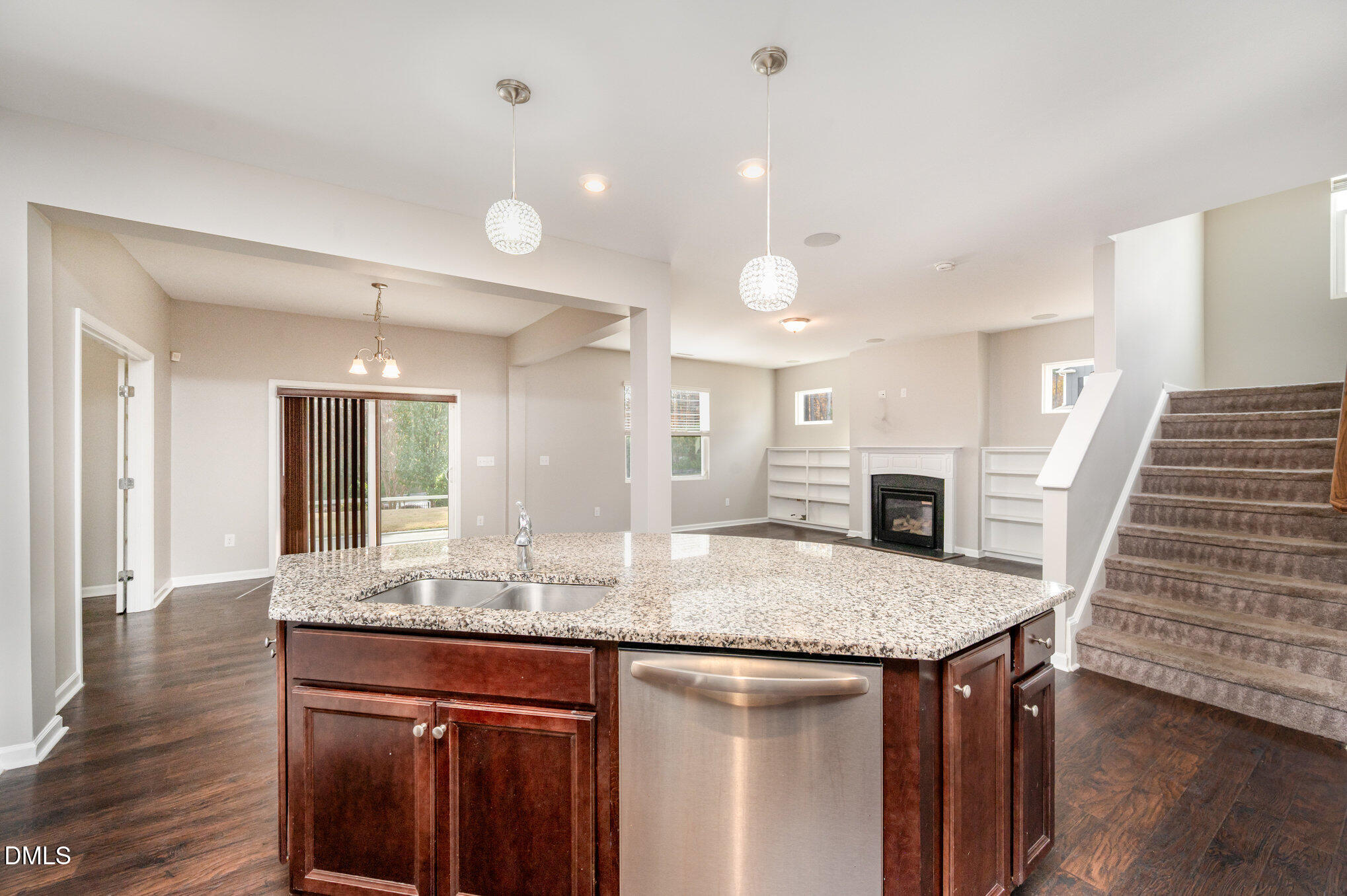 18 Dover Ridge Court Chapel Hill, NC 27517 - Photo 11 of 40 a kitchen with kitchen island granite countertop a stove and granite counter tops
