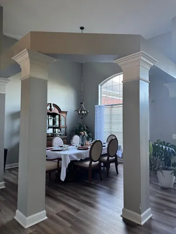 a view of a yard with a tree