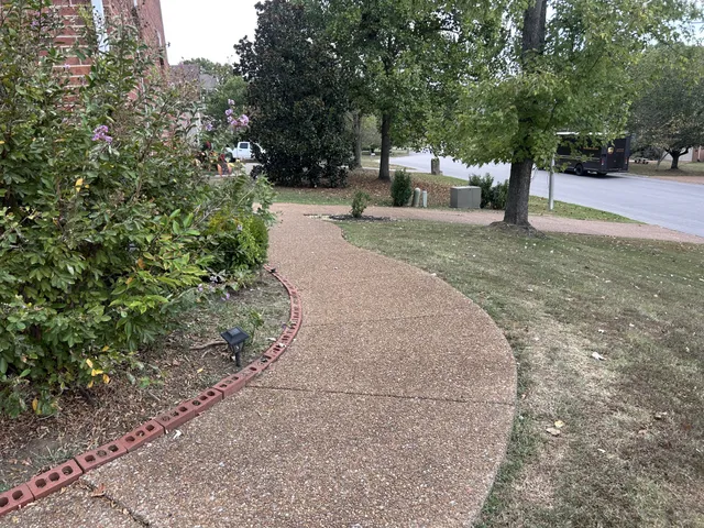 a view of a living room and a wooden floor
