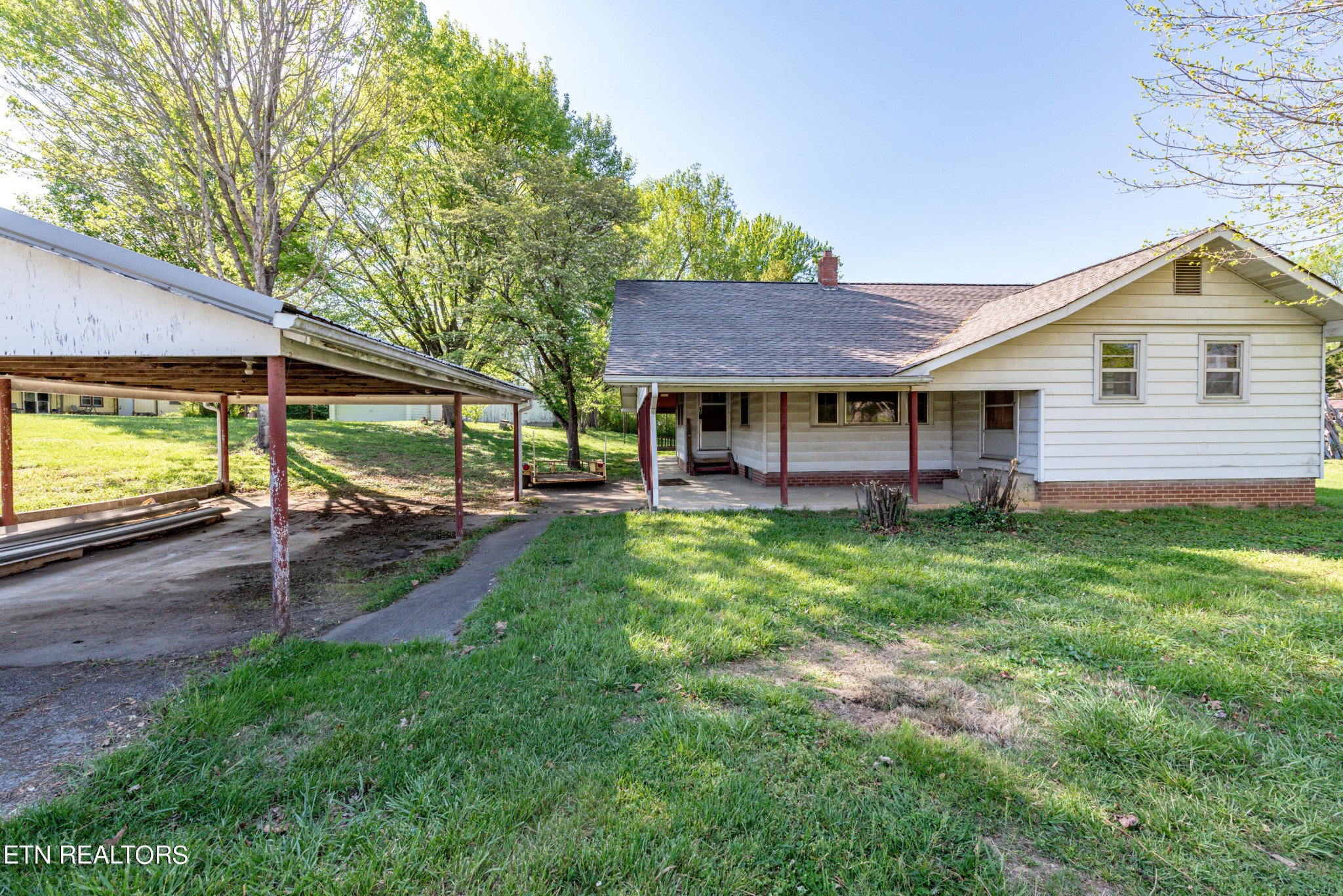 115 Wears Valley Road Townsend, TN 37882 - Photo 3 of 49 a view of a house with a backyard