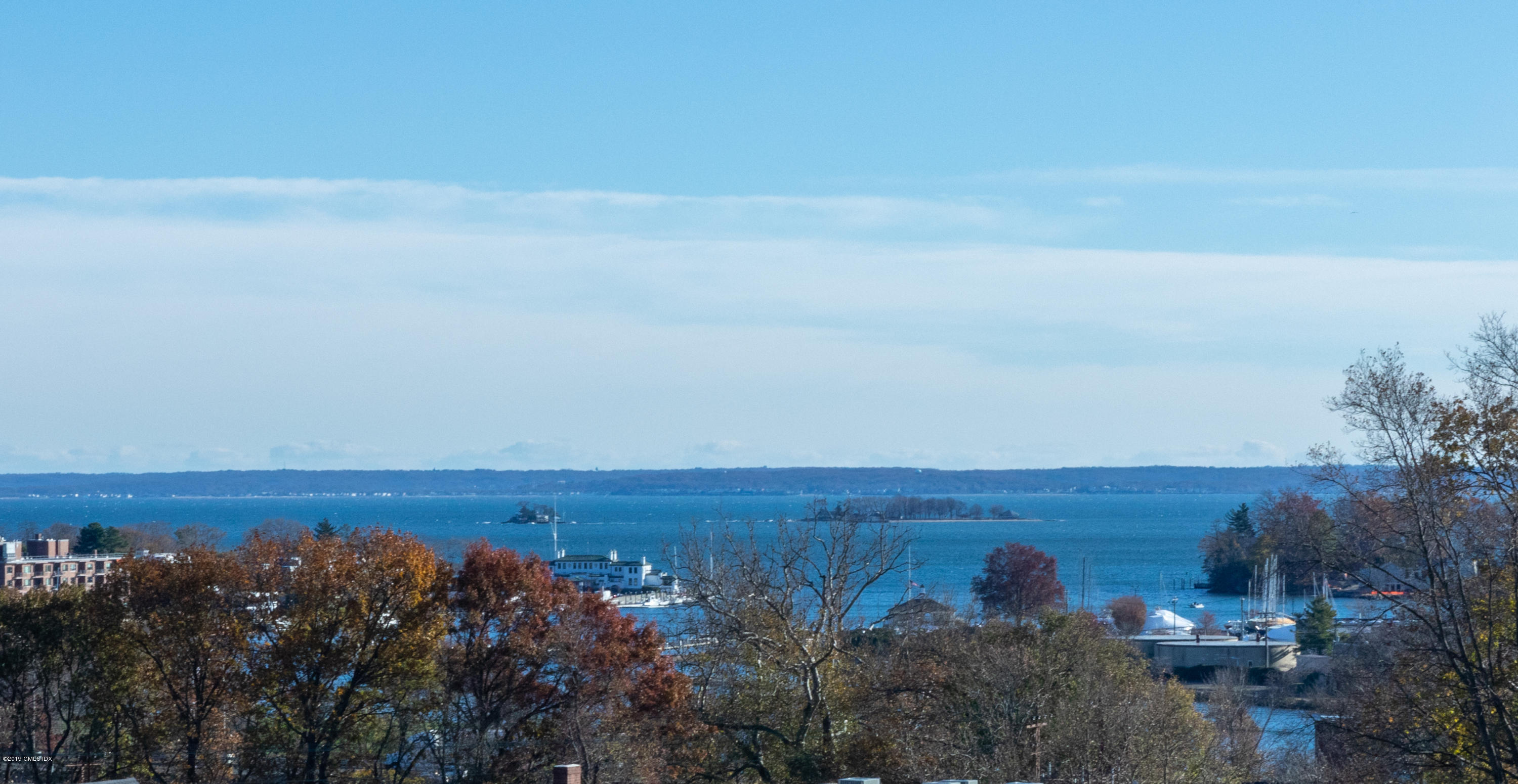 70 Sound View Drive, Unit PH WEST Greenwich, CT 06830 - Photo 11 of 16 a view of a field with an ocean