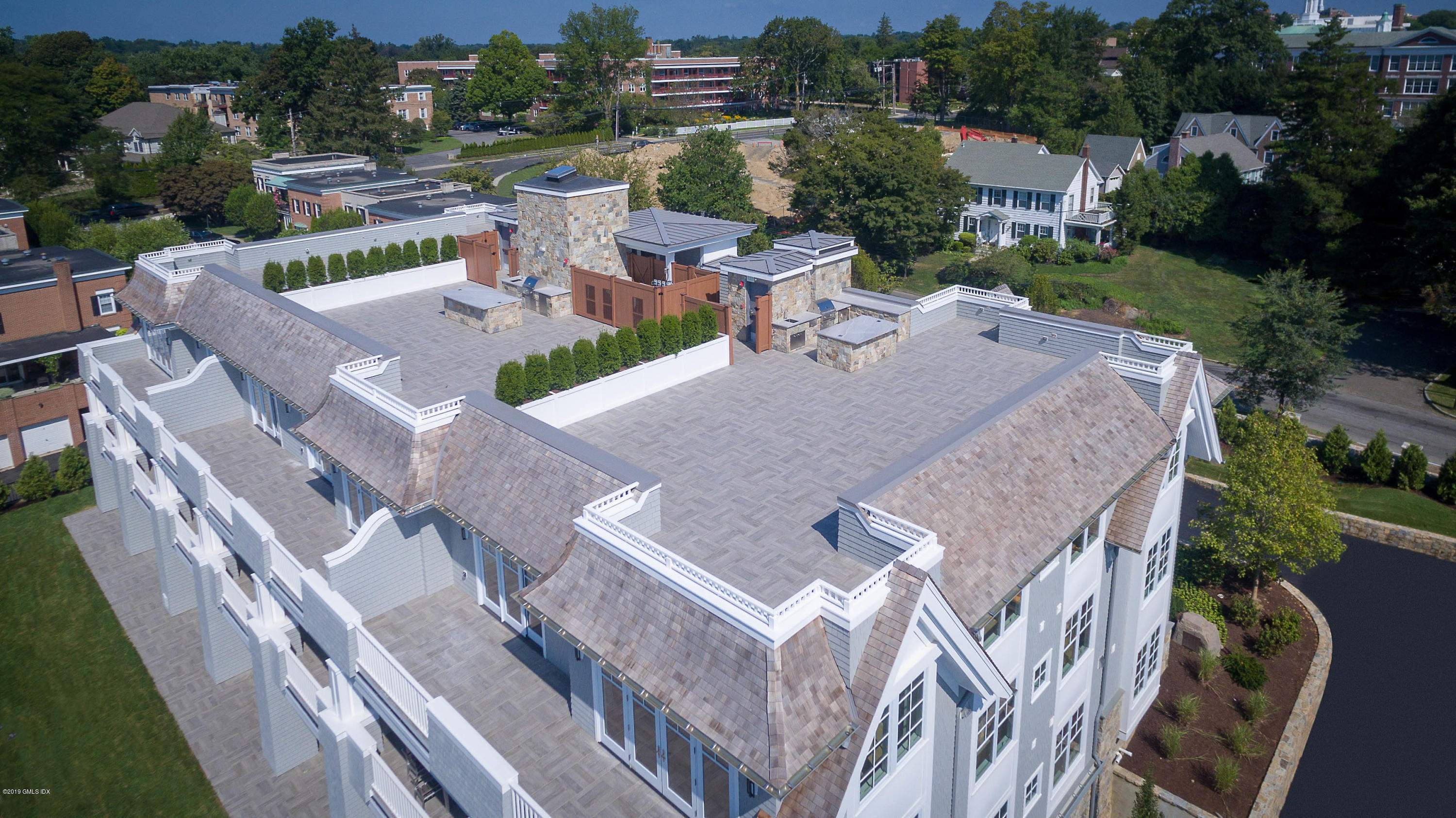 70 Sound View Drive, Unit PH WEST Greenwich, CT 06830 - Photo 12 of 16 an aerial view of a house with outdoor space and street view