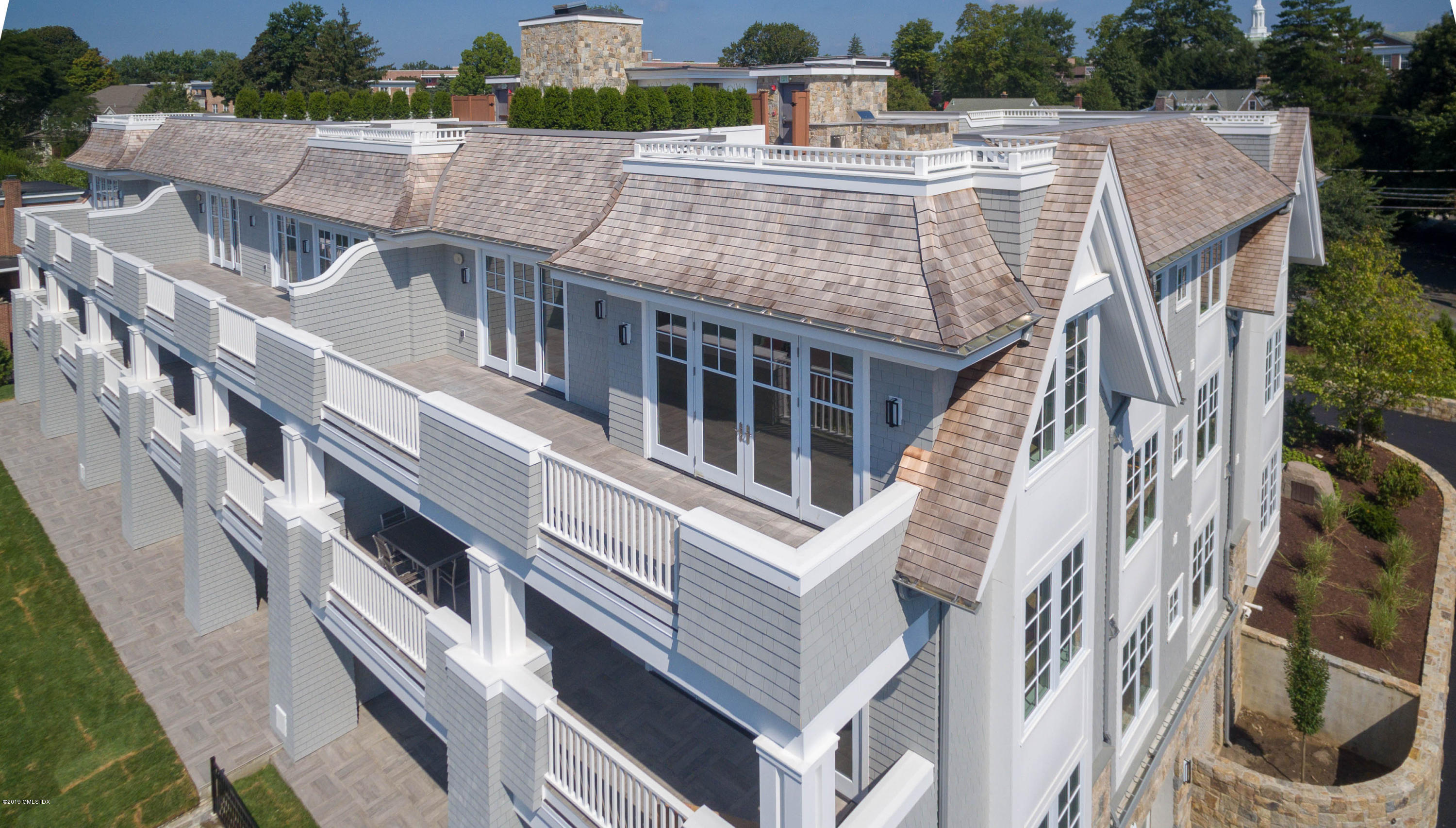 70 Sound View Drive, Unit PH WEST Greenwich, CT 06830 - Photo 14 of 16 aerial view of a house with a balcony