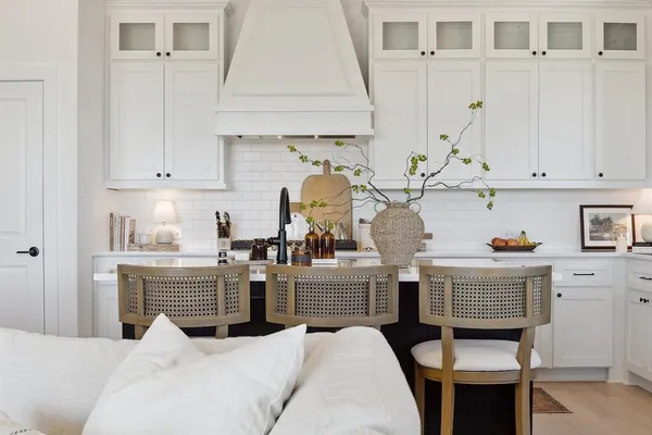 a kitchen with stainless steel appliances granite countertop a stove a sink dishwasher and cabinets