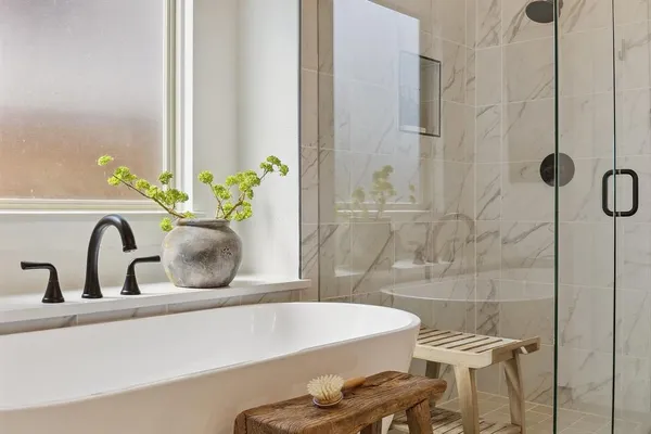 a bathroom with a sink and a shower