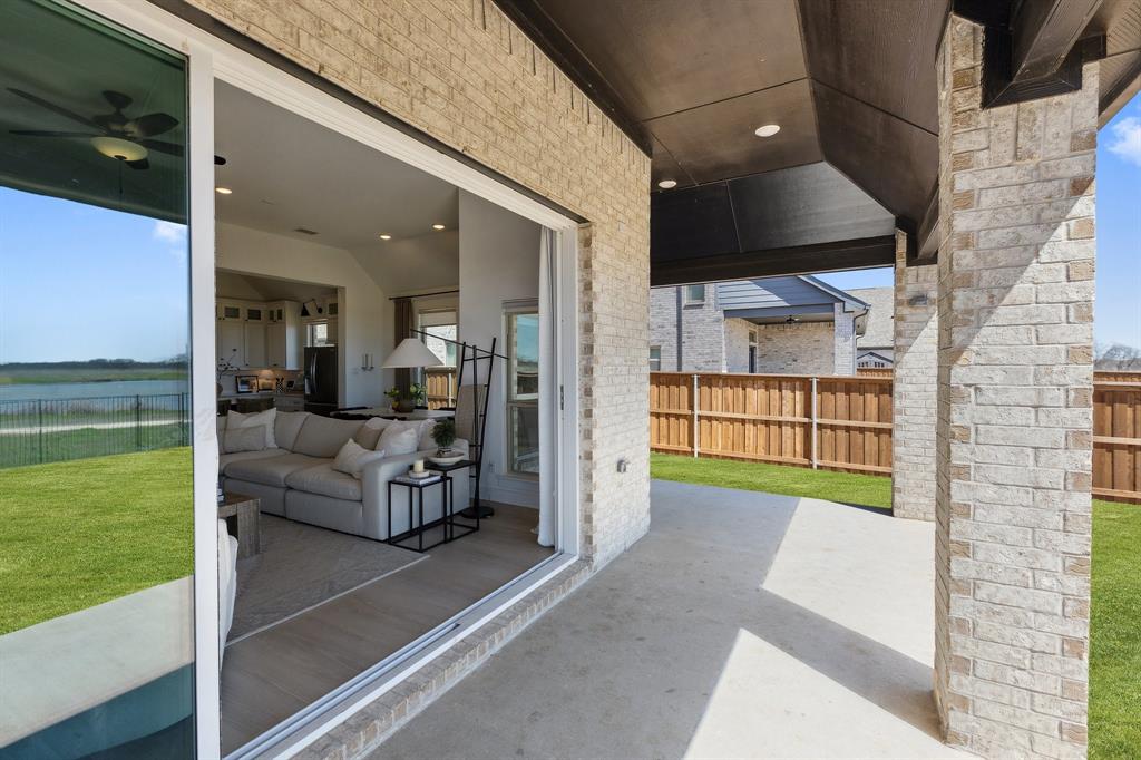 2107 Ozarks Court Forney, TX 75126 - Photo 33 of 40 a view of a living room and a balcony