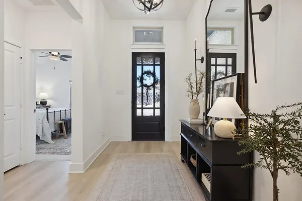 a room with furniture and wooden floor