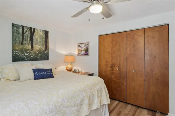 a living room with furniture and flat screen tv