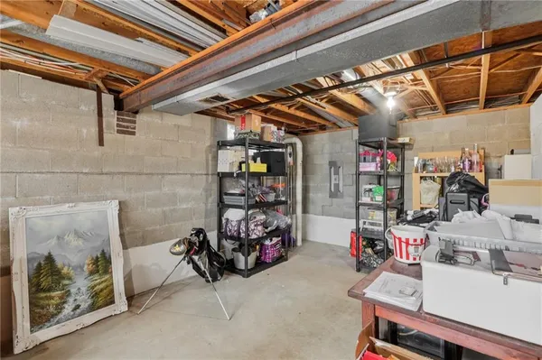 a view of a house with a snow in the yard