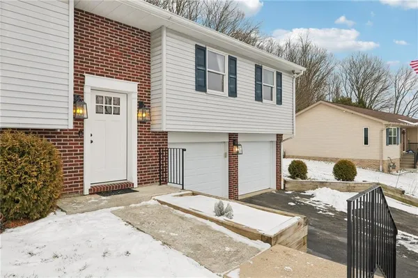a view of a patio with couches chairs and potted plants