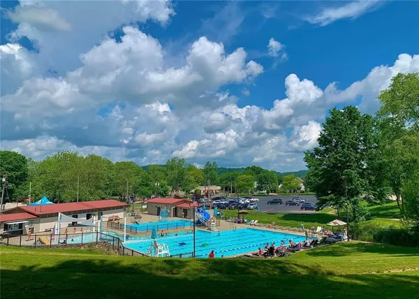 a sign on the corner of the street