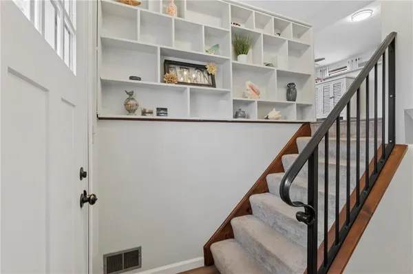 a view of entryway and workspace