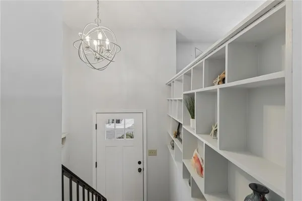 a view of entryway with wooden floor